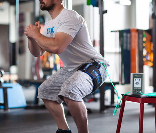 Blood Flow Restriction Therapy: A person getting Blood Flow Restriction therapy.