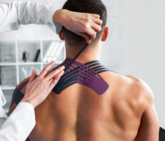 Kinesio Taping: Expert physical therapist from All-Pro Physical Therapy applying Kinesio Tape.
